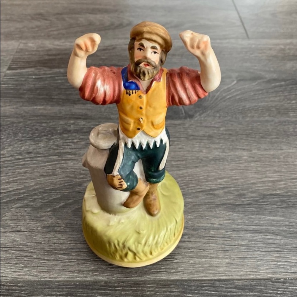 Vintage Sankyo musical milkman figurine